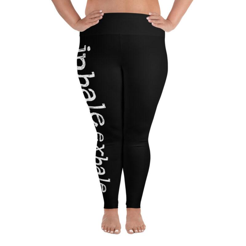 A plus size model wearing Inhale Exhale high waist leggings